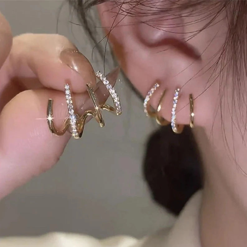 Gold hot sale claw earrings